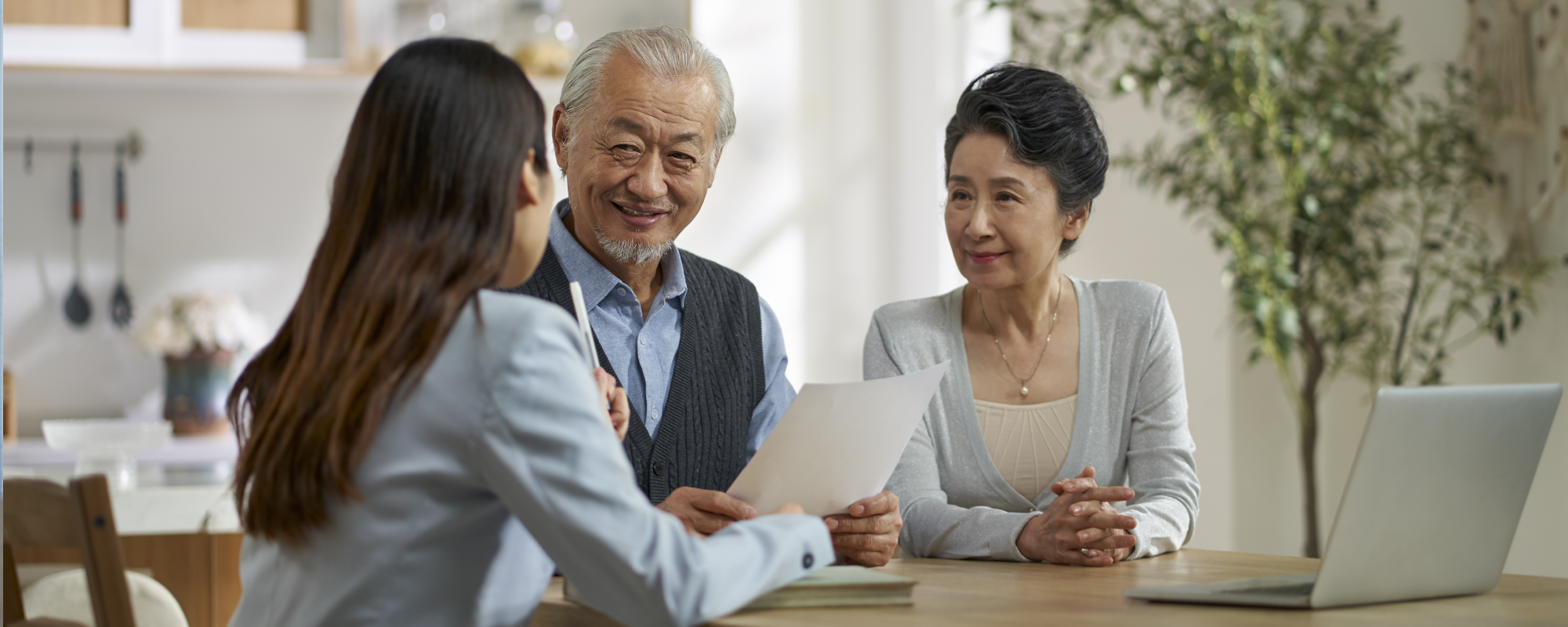 Man and woman meeting with their wealth professional