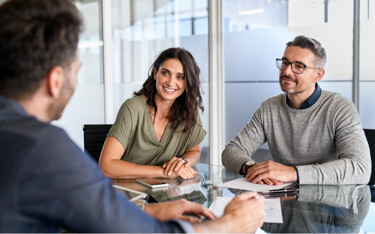 man and woman in a meeting