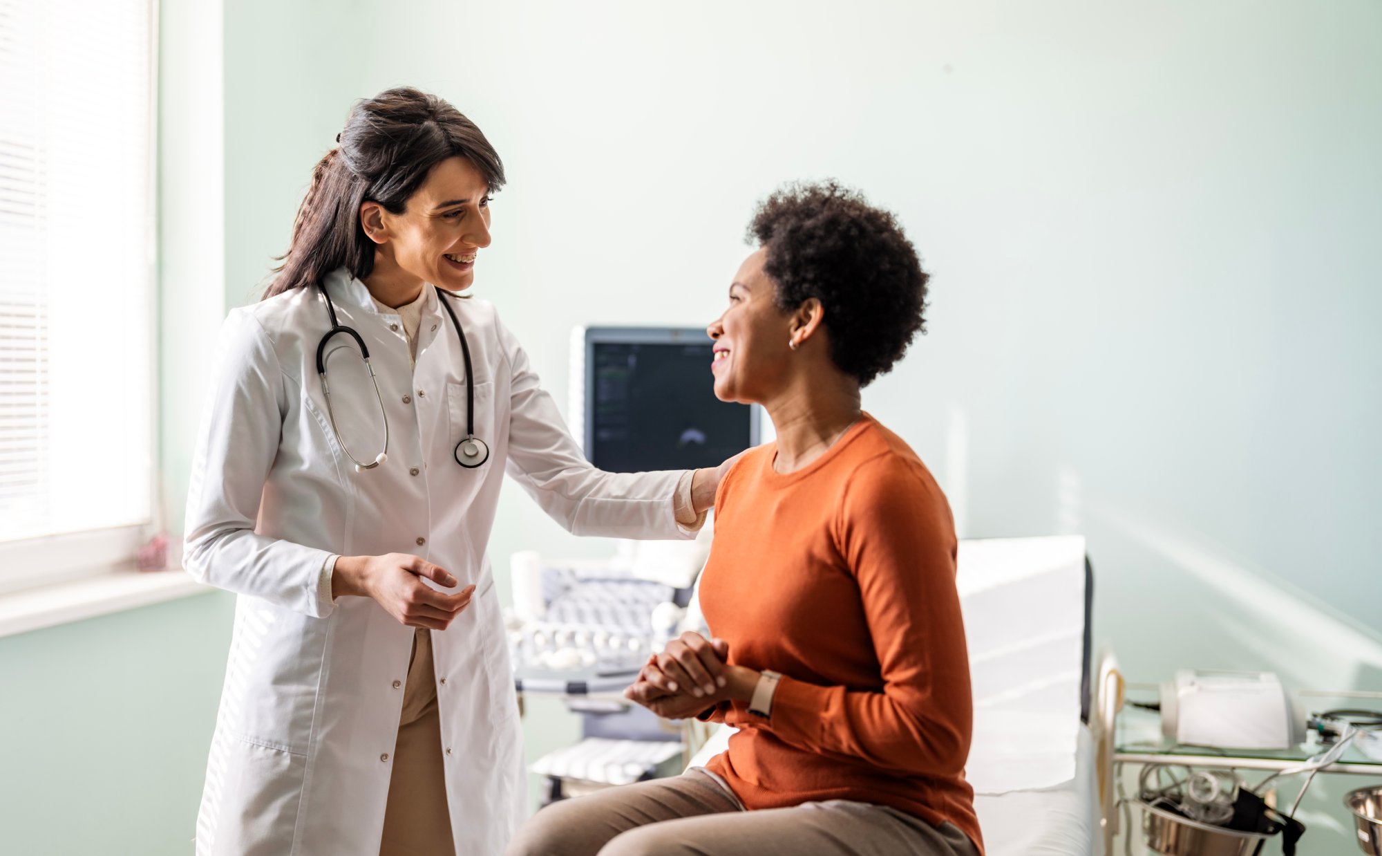 doctor speaking to patient